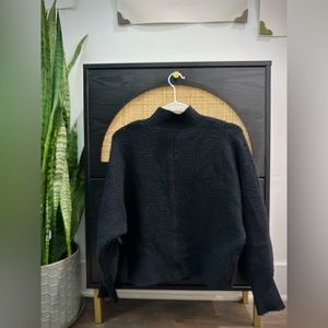 Black mock turtleneck sweater